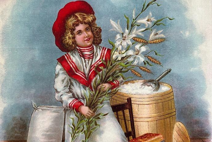 A child in a red hat holds lilies and wheat by a flour barrel and bread.