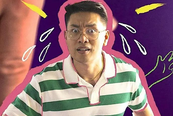 James Roque in glasses looks surprised against a purple backdrop with bright playful doodle accents.