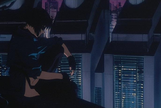 Animated person sitting on a rooftop overlooking a futuristic city at night.