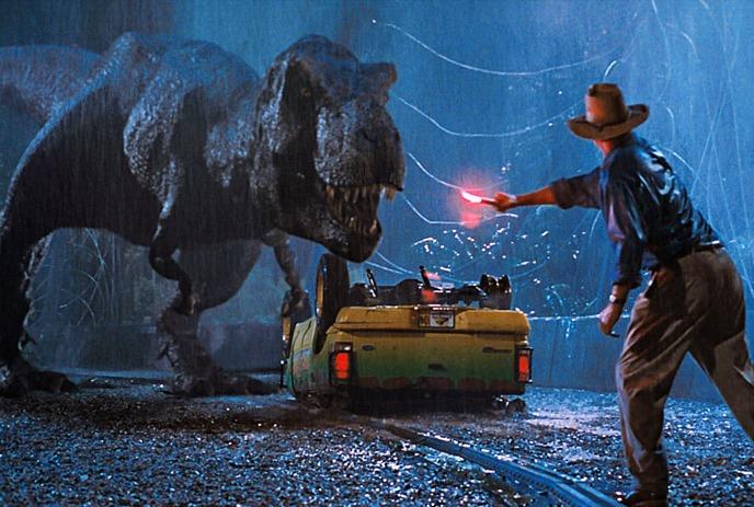 A scene from the 1993 movie Jurassic Park where the main character confronts a large T-Rex dinosaur