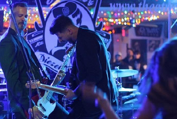 The band Koncepts playing live on stage at Palasad Socialbowl located in London, Ontario