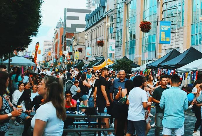 A crowd at a festival on Dundas Place Block #1.