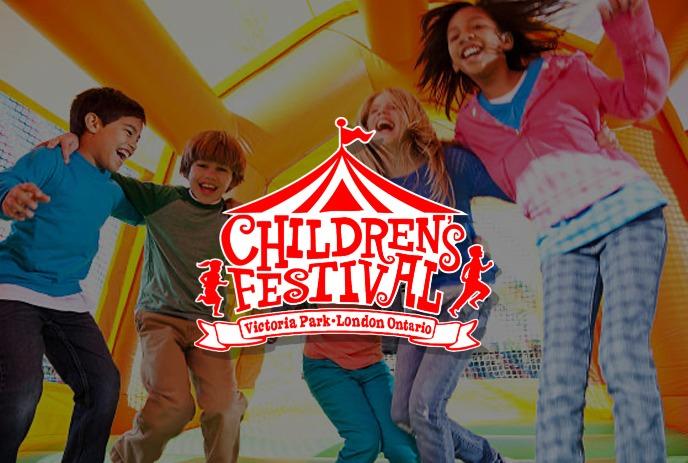 A vibrant carnival scene with a spinning animal ride and a towering blue