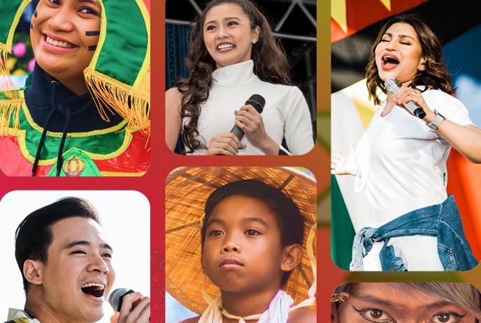 A lively group of people performing on stage at a previous Fiesta Extravaganza event.