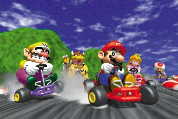 Mario, Wario, Bowser, Peach and Toad racing each other on a Mario Kart track.