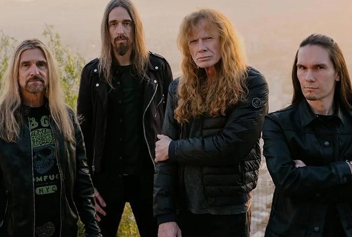 Members of the metal band Megadeth standing outdoors