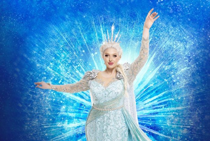 An ice queen wearing light blue and white dress with a tiara, and a blue background behind them.