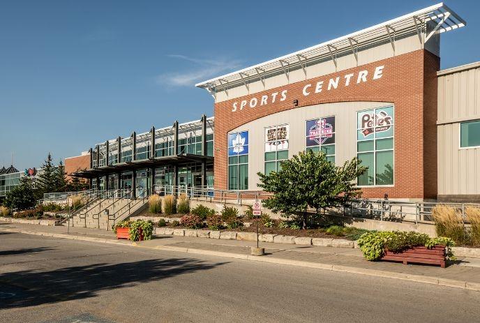 Western Fair Districts - Sports centre building on a sunny day.