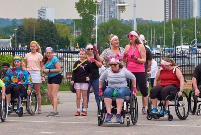 People participating in the SCIO London Wheelchair Relay Challenge.