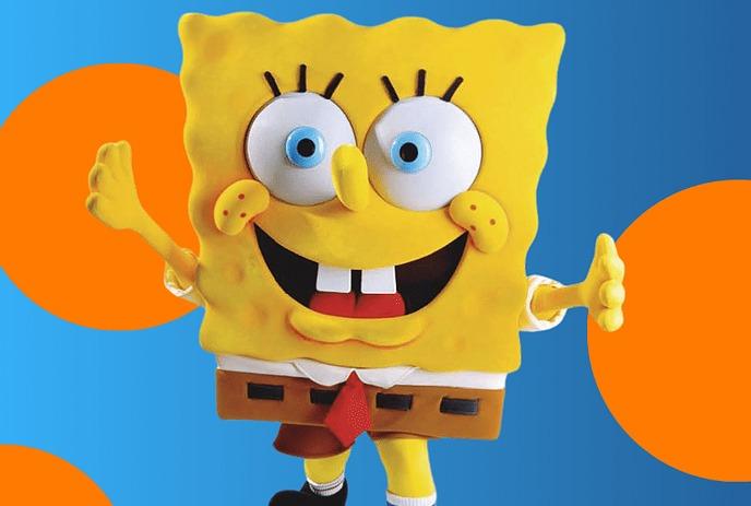 SpongeBob with open arms in front of a blue background with spots.