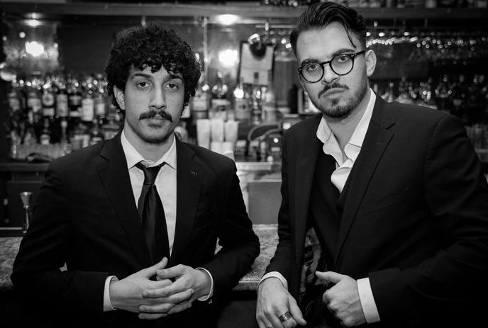Musicians from the band Lookout Service in dressed in suits