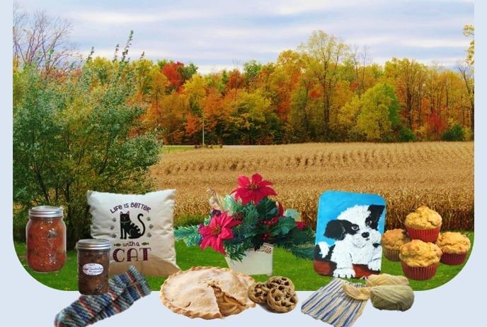 An assortment of items such as pies and pillows, in front of a field with trees in the background.