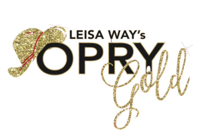 Gold cowgirl hat with red ribbon sitting on the word Opryy.
