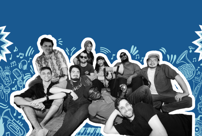 Group of people sitting around together with blue background.