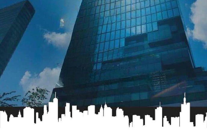 Modern glass tower reflects sky; stylized city silhouette below adds contrast and urban elegance.