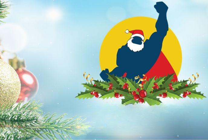 Muscular figure with Santa hat and beard raises fist with ornaments, holly, and wintry glow in the background.
