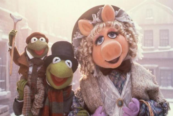 Miss Piggy, Kermit the Frog and Robin as the Cratchits dressed in period costumes.