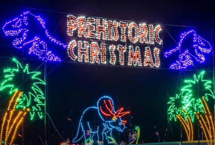 Magic of Lights prehistoric Christmas with T-Rex and a Triceratops done in lights.