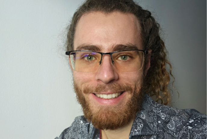 Single image of Ryan Baxter looking at the camera.