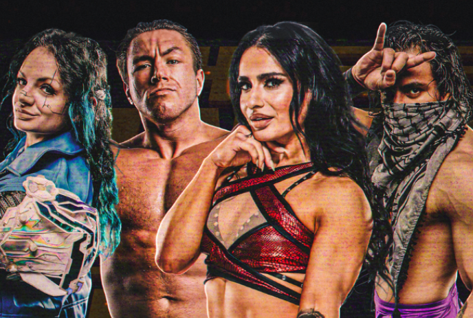 Four people dressed in wrestling attire pose to have their images done.