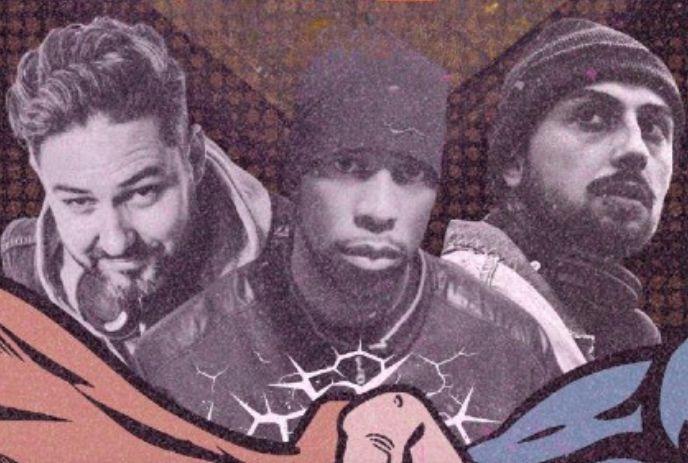 Three artists stand before a patterned backdrop in layered jackets and beanies in bold graphic style.