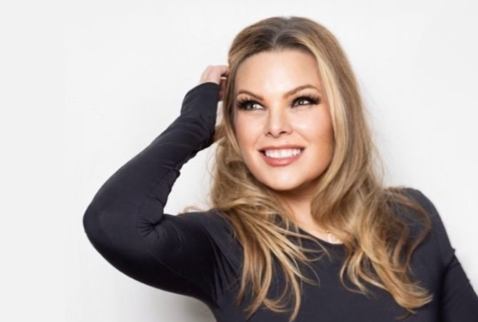 Tiffany Rice Psychic Medium looking to the side while posing for a photo.