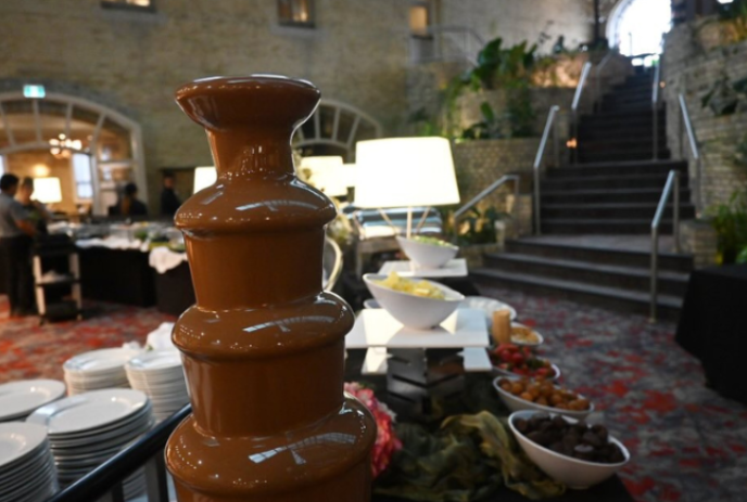 A chocolate fountain sits on a buffet table in the Delta Armouries dining area.