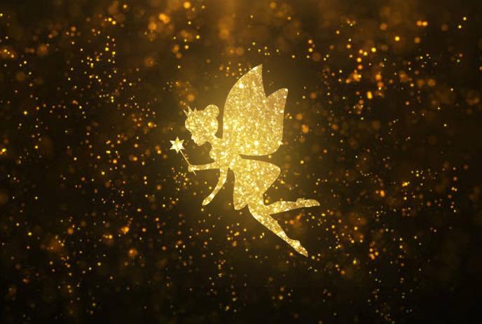 Floating gold magic dust and a golden fairy