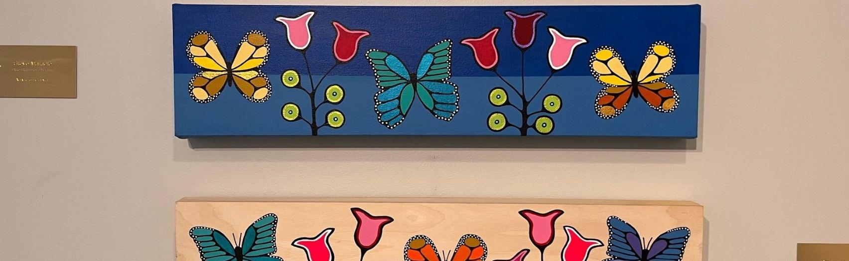 Indigenous art pieces at Tourism London Wellington Welcome Centre.