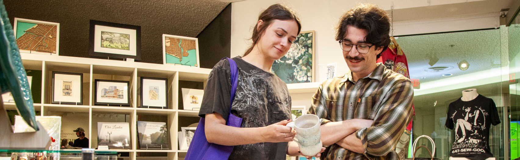 Two visitors shopping for local gifts.