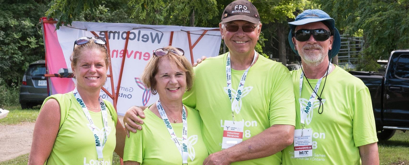 Four volunteers in uniform posing for a picture at the 2018 Ontario Summer Games