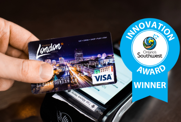 tourism london visa card tapping on a credit card machine