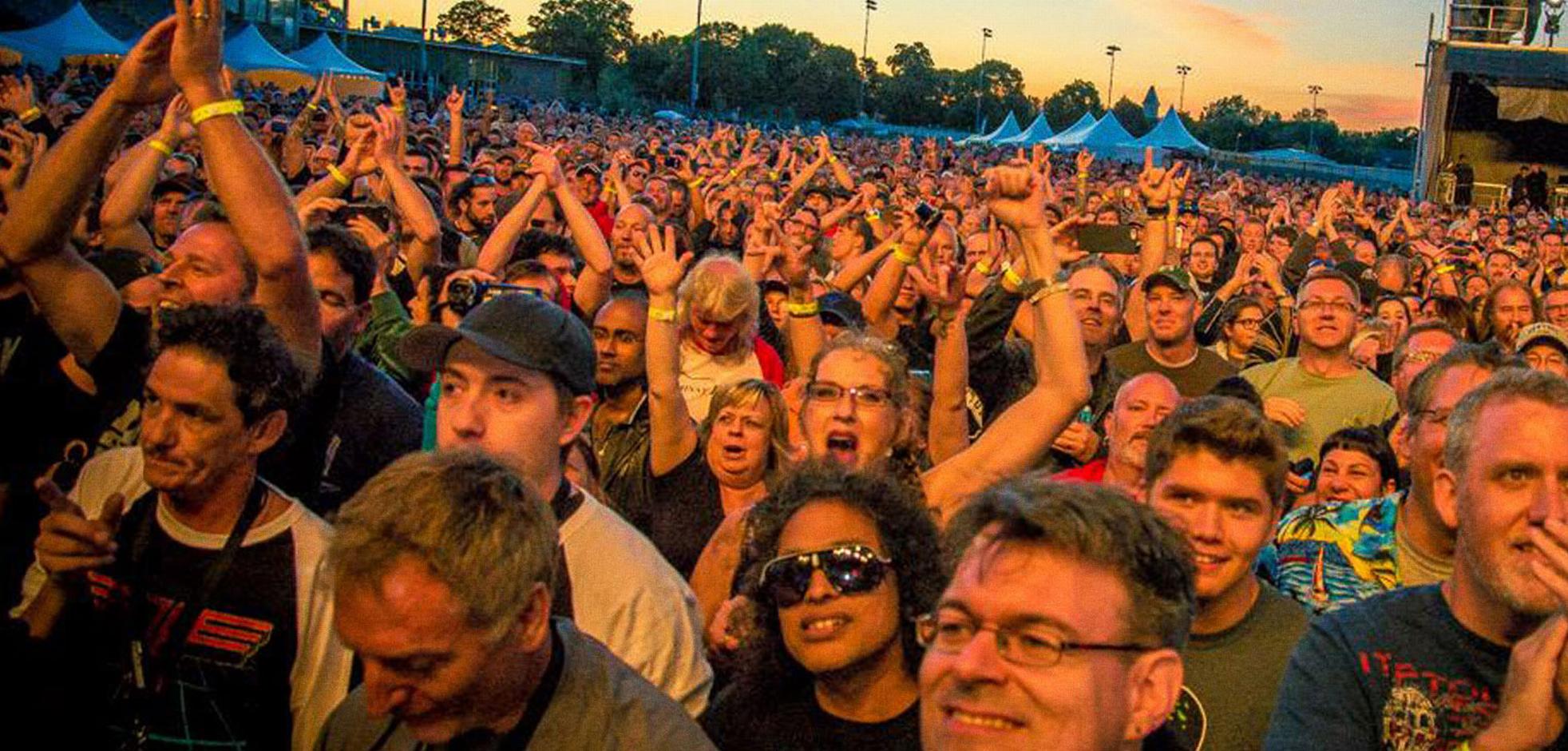 audience enjoying concert clapping