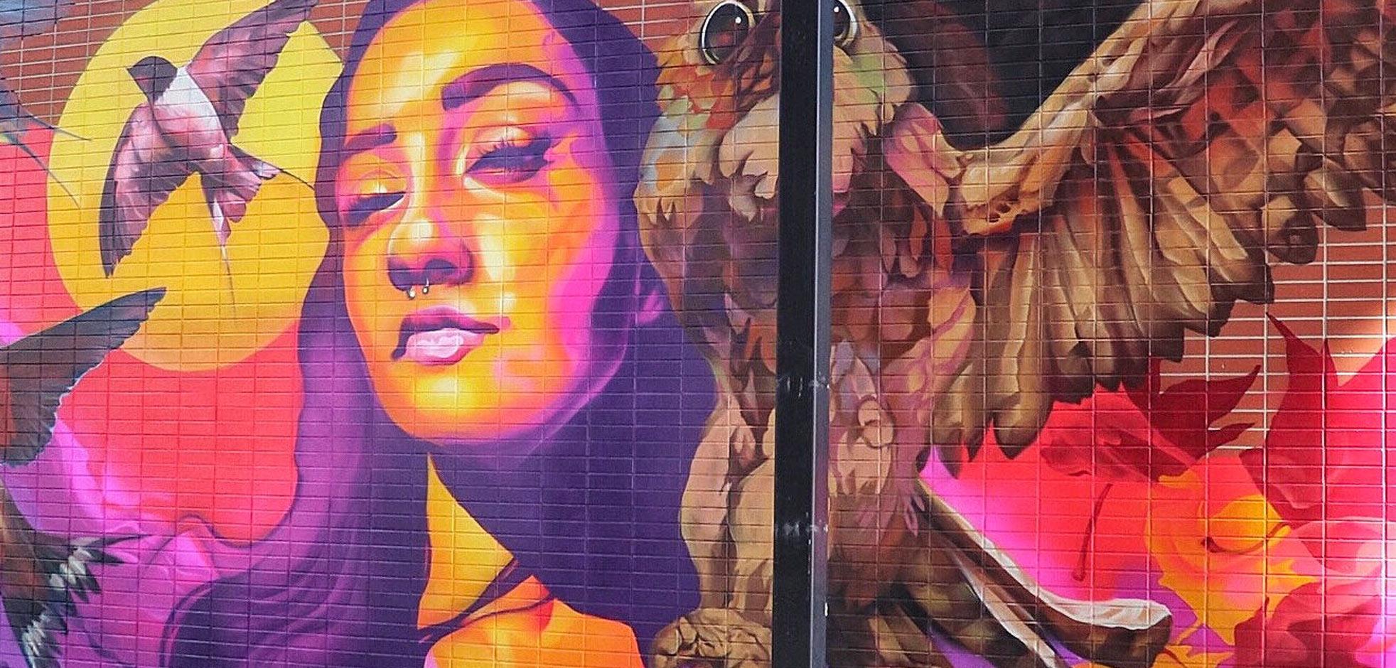 Mural painting on wall of market lane in Downtown London, Ontario