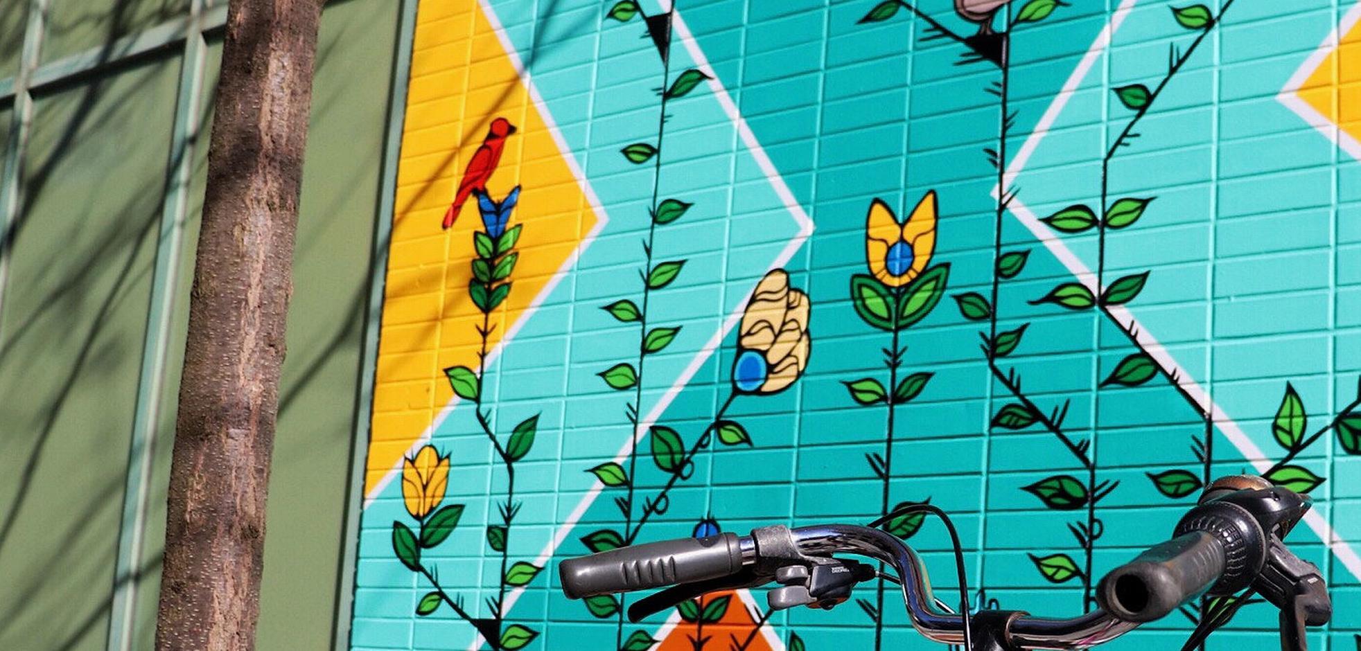 a brick wall mural at Market Lane Park