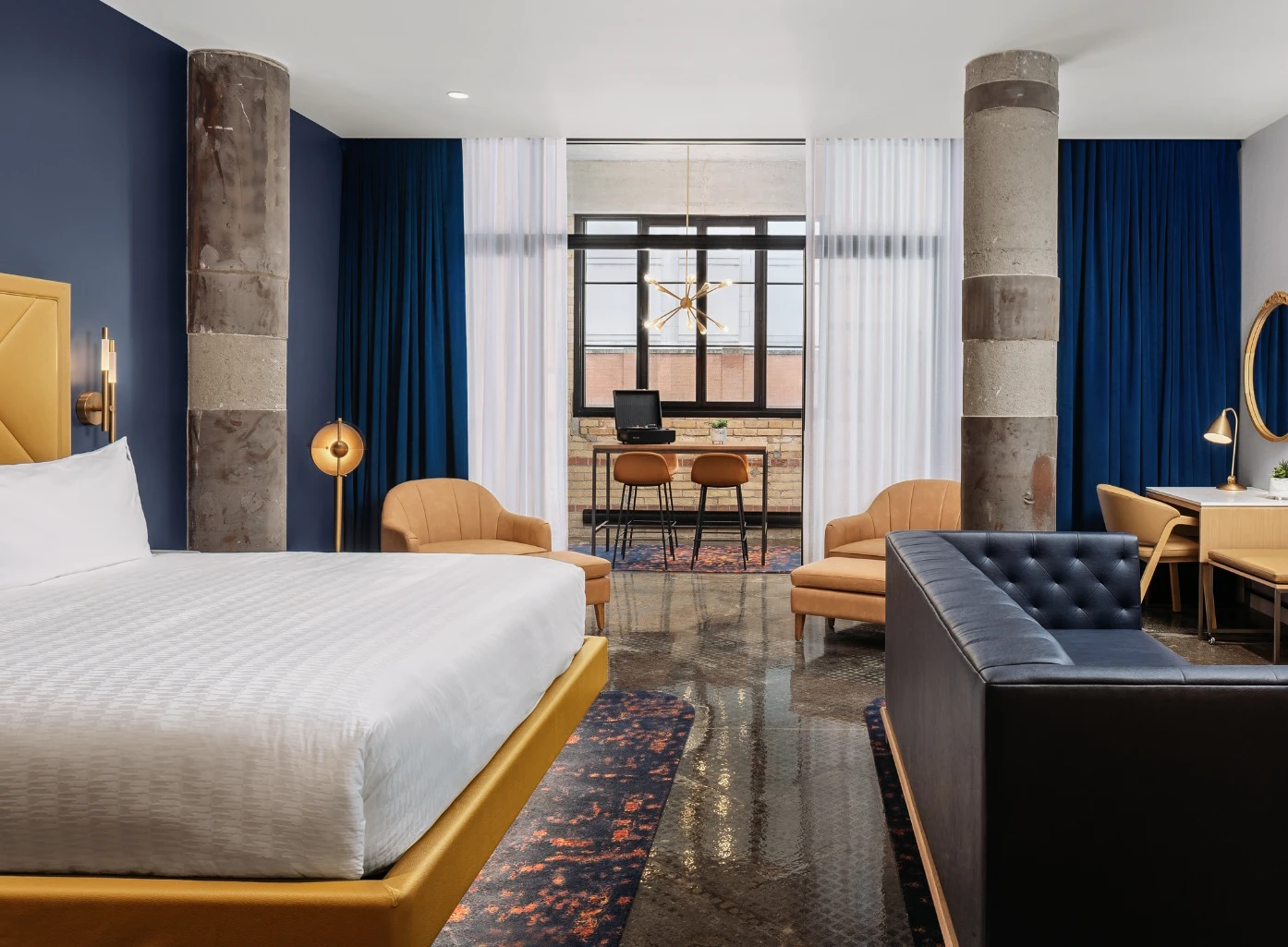 hotel room with a window dresser and luxurious bed