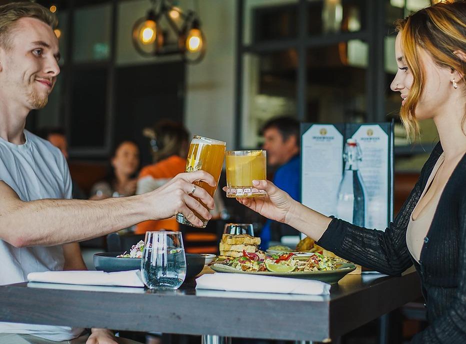 A couple having dinner at Ironwood Kitchen & Bar located in London, Ontario