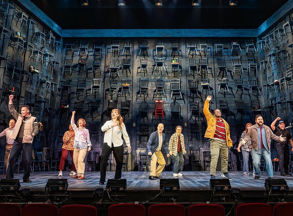 Cast members of the production 'Come From Away' performing live of stage at the Grand Theatre in London, Ontario