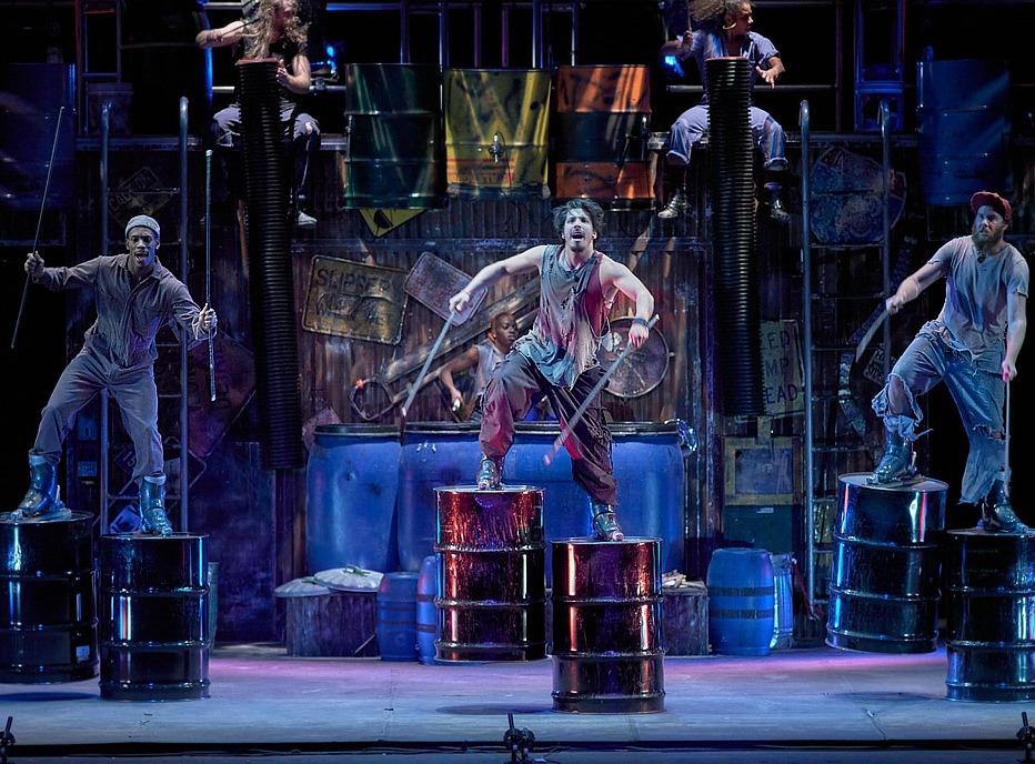 Various performers on stage on the Broadway production STOMP
