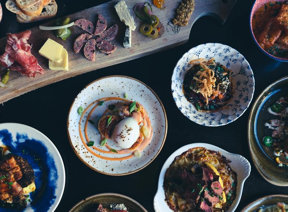 An aerial view of various dishes prepared by the restaurant Hunter & Co. in London, Ontario