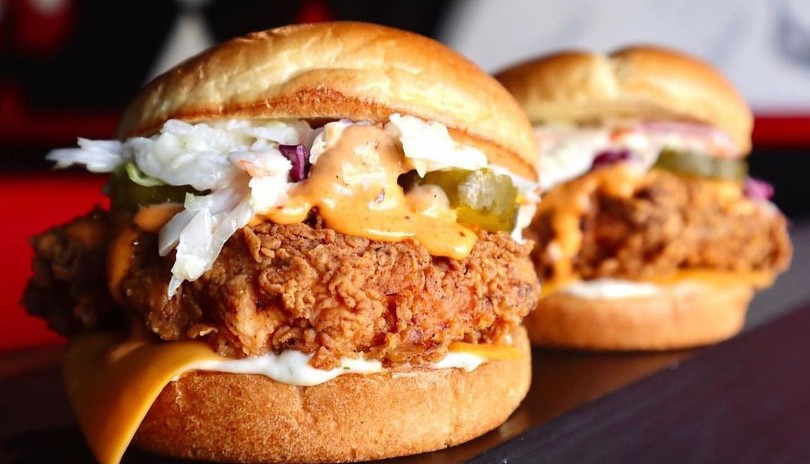 Crispy Chicken on a bun with coleslaw and hot sauce from Kluck It in London, Ontario