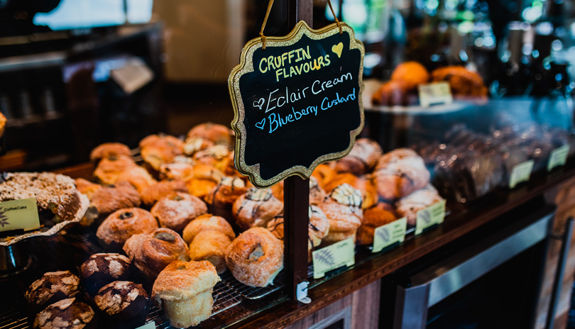 Various pastries on display at the front counter of the Black Walnut Bakery Café located in London, Ontario