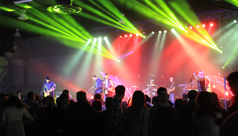 A live band playing at the Brier Patch event with a crowd looking on
