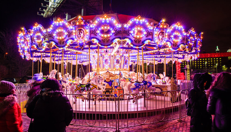 A festive horse carousel located on Dundas Place near Market Lane outside Fanshawe College in London, Ontario