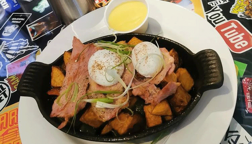 A delicious meal of eggs, bacon, and hash browns from the The Early Bird.