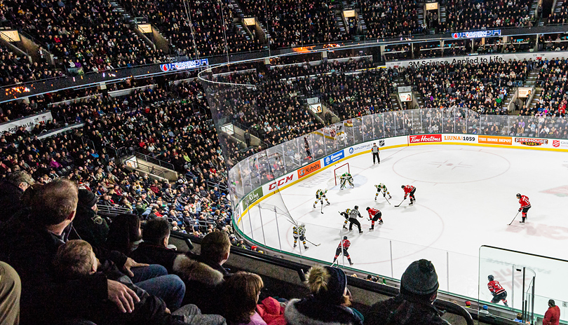 A large crowd of people watching a hockey game from the London Knights live at Canada Life Place located in London, Ontario