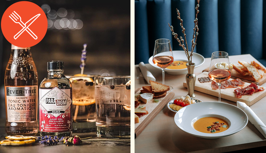 Mixed drink glasses with a bottle of gin from Paradigm Spirits resting on top of a table and an above view of a table with two wine glasses, soup and a charcuterie board in Grace Restaurant - both located in London, Ontario, Canada