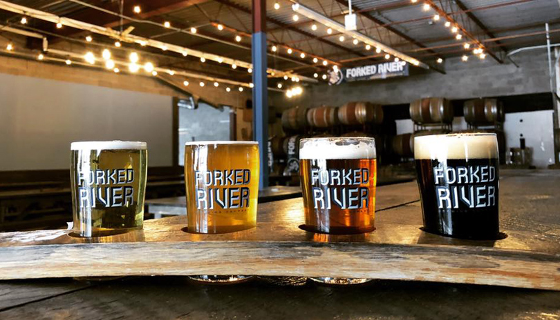 A flight of four beer samplers from Forked River Brewing Company located in London, Ontario