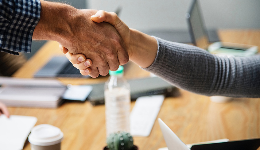 two people shaking hands