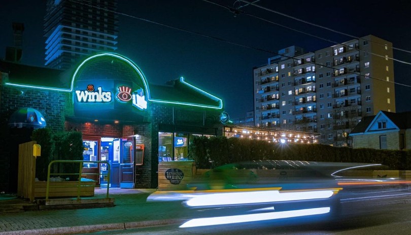Exterior night shot of Winks Eatery
